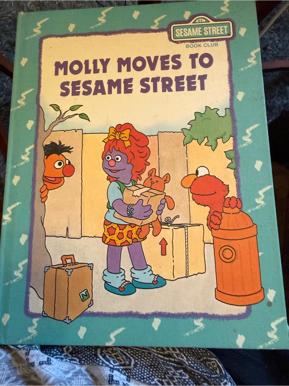 Molly Moves to Sesame Street - Sesame Street hardcover Book